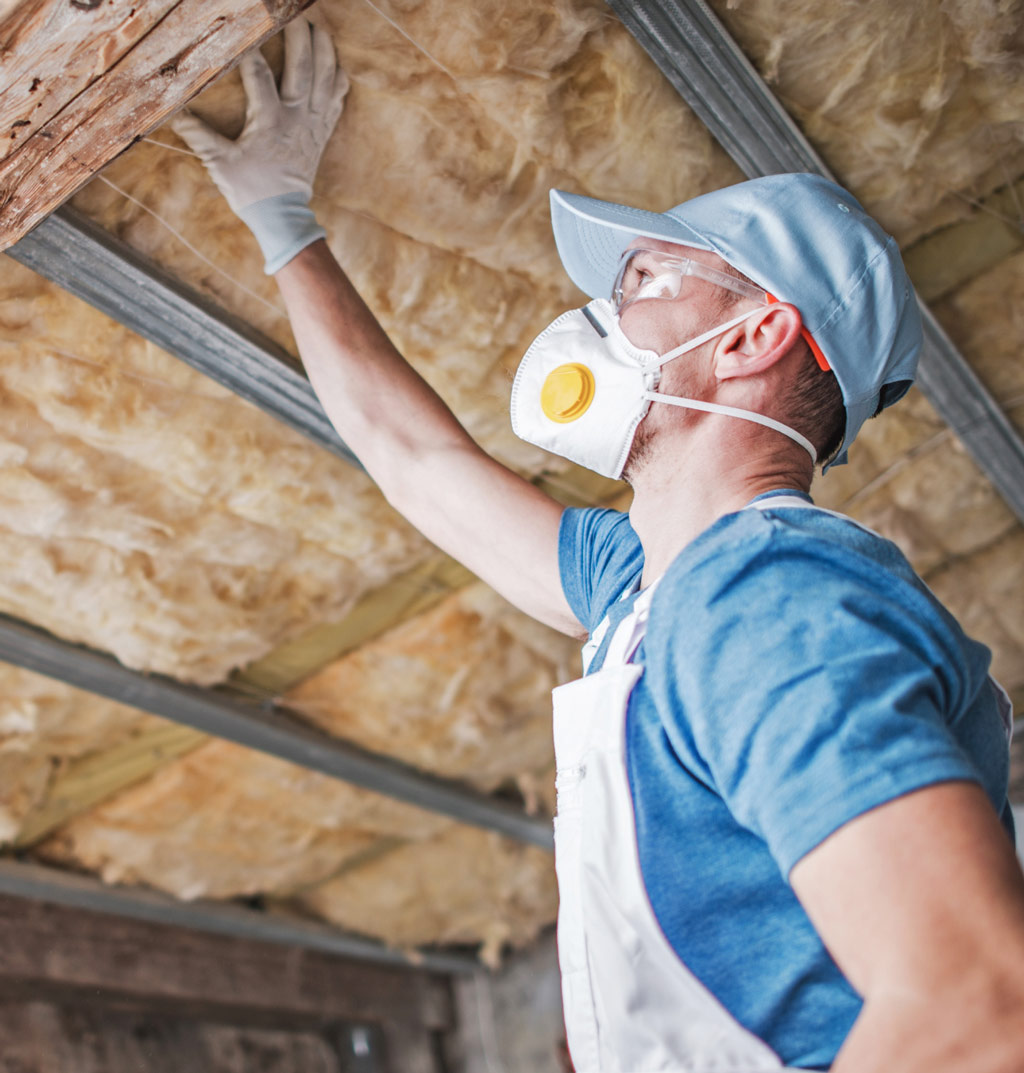 Inspecting attic insulation for signs of mould