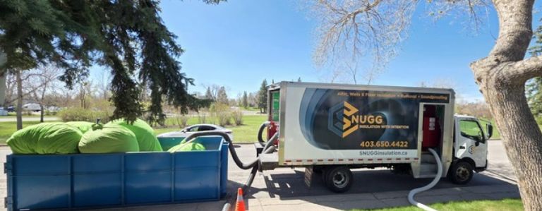 Snugg truck with bins for insulation removal hero 768x299